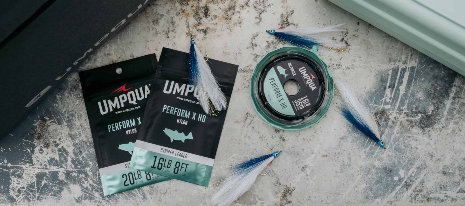 Umpqua Fly Fishing Leader packages on a textured surface