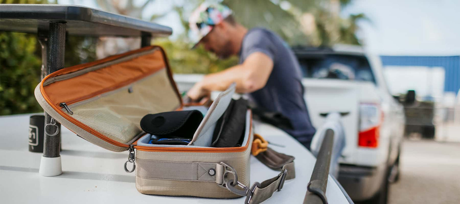 Fishpond Luggage and Fly Fishing Travel Gear Getting Loaded Onto Fishing Boat