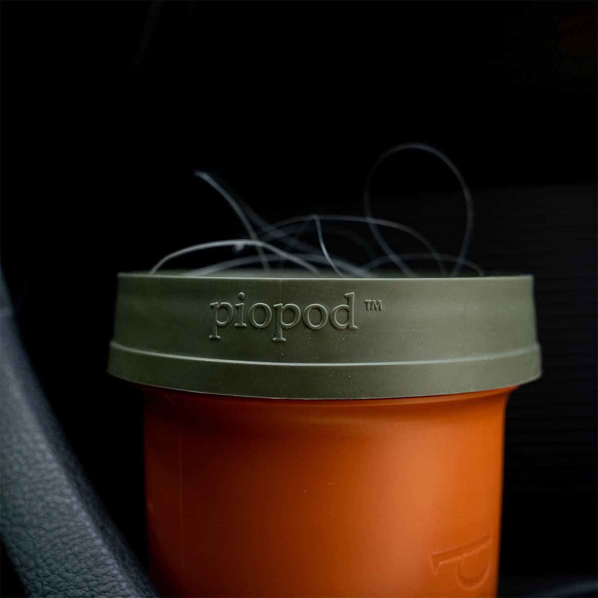 816332012105 Fishpond Largemouth PIOPOD Cutthroat Orange Micro Trash Cupholder Container With Fishing Line
