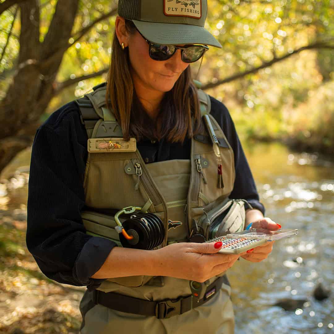 816332016790 Fishpond FlyLite Women's Fly Fishing Vest Choosing A Fly