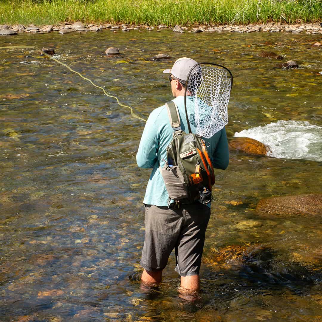 New 2025 816332016233 Fishpond Stormshadow Sling Pack Water Resistant Ambidextrous Fly Fishing Sling Pack On Clear water