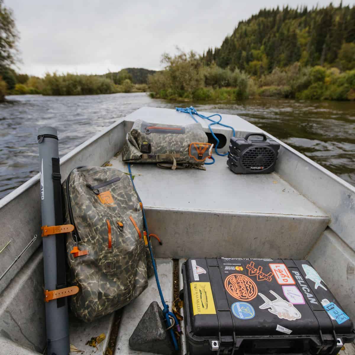 TSB-ESC 816332016332 Fishpond Thunderhead Submersible Backpack Fully Waterproof Fishing Backpack Eco Shadowcast Camo Newstream Model New 2024 Closeup On Raft With Windriver