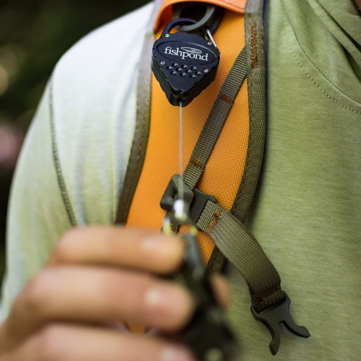 fishpond arrowhead fishing accessory retractor fishing zinger blackrock color on fishpond pack