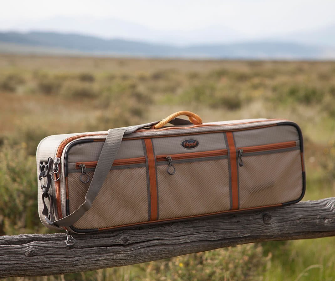 Fishpond Dakota Carry On Rod And Reel Case On Fence Two
