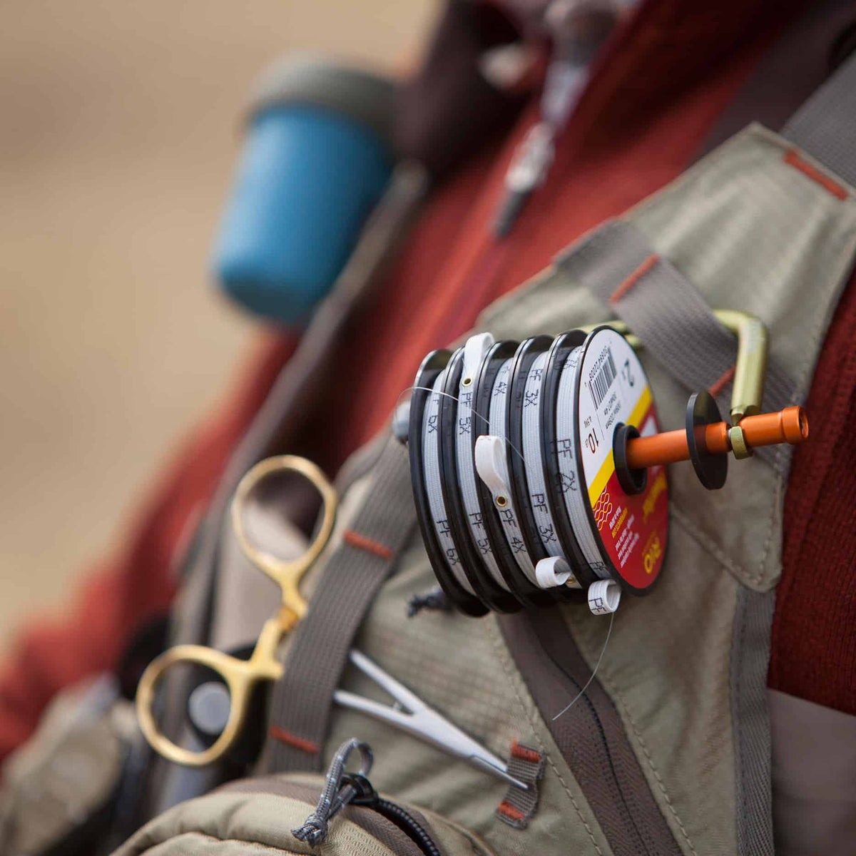 Fishpond Headgate Fishing Tippet Holder Tippet Dispenser on Fishing Vest