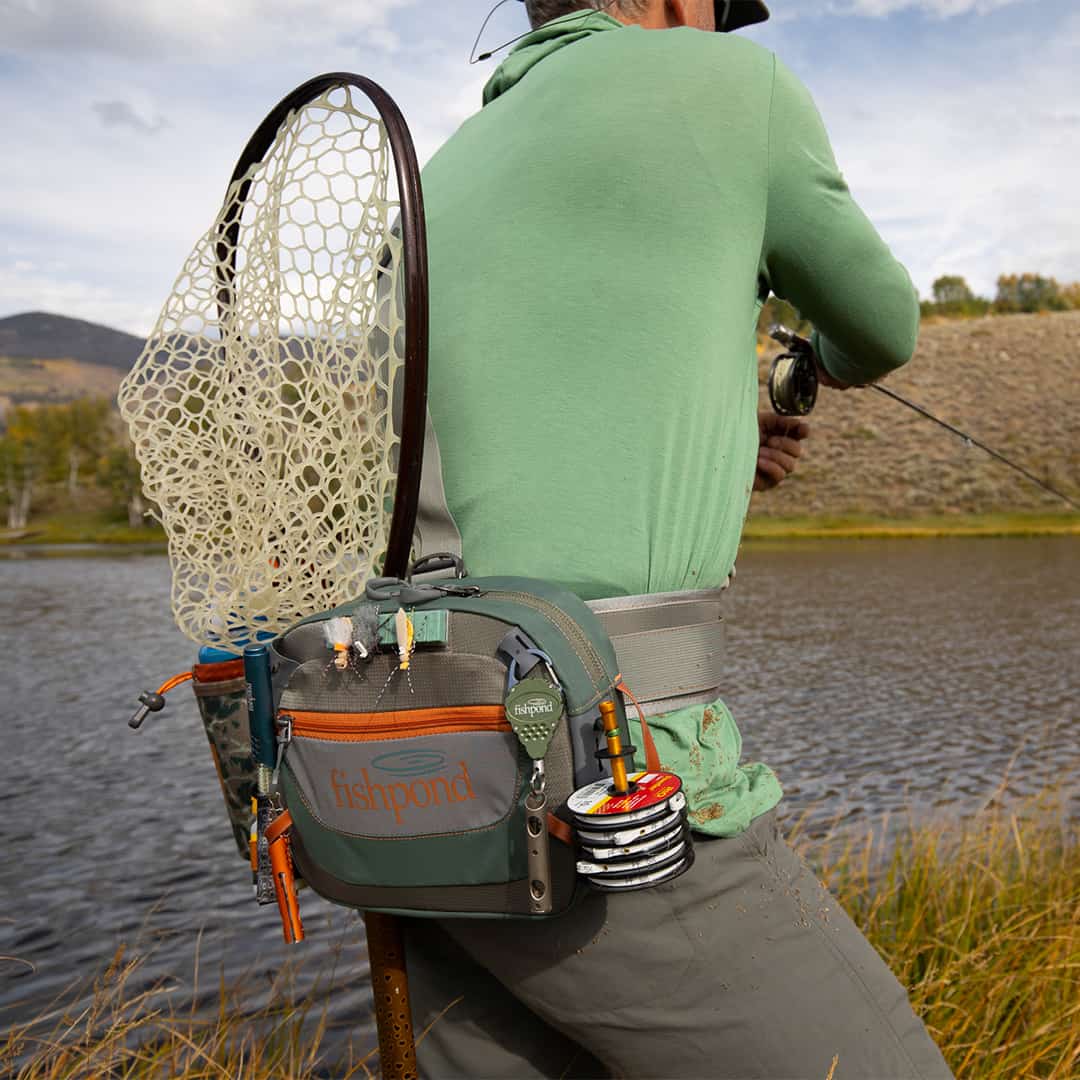 SBBS-2-0 816332014802 Fishpond Switchback 2 0 Wading Belt And Fishing Waist Pack System Highlighting Accessories on Water