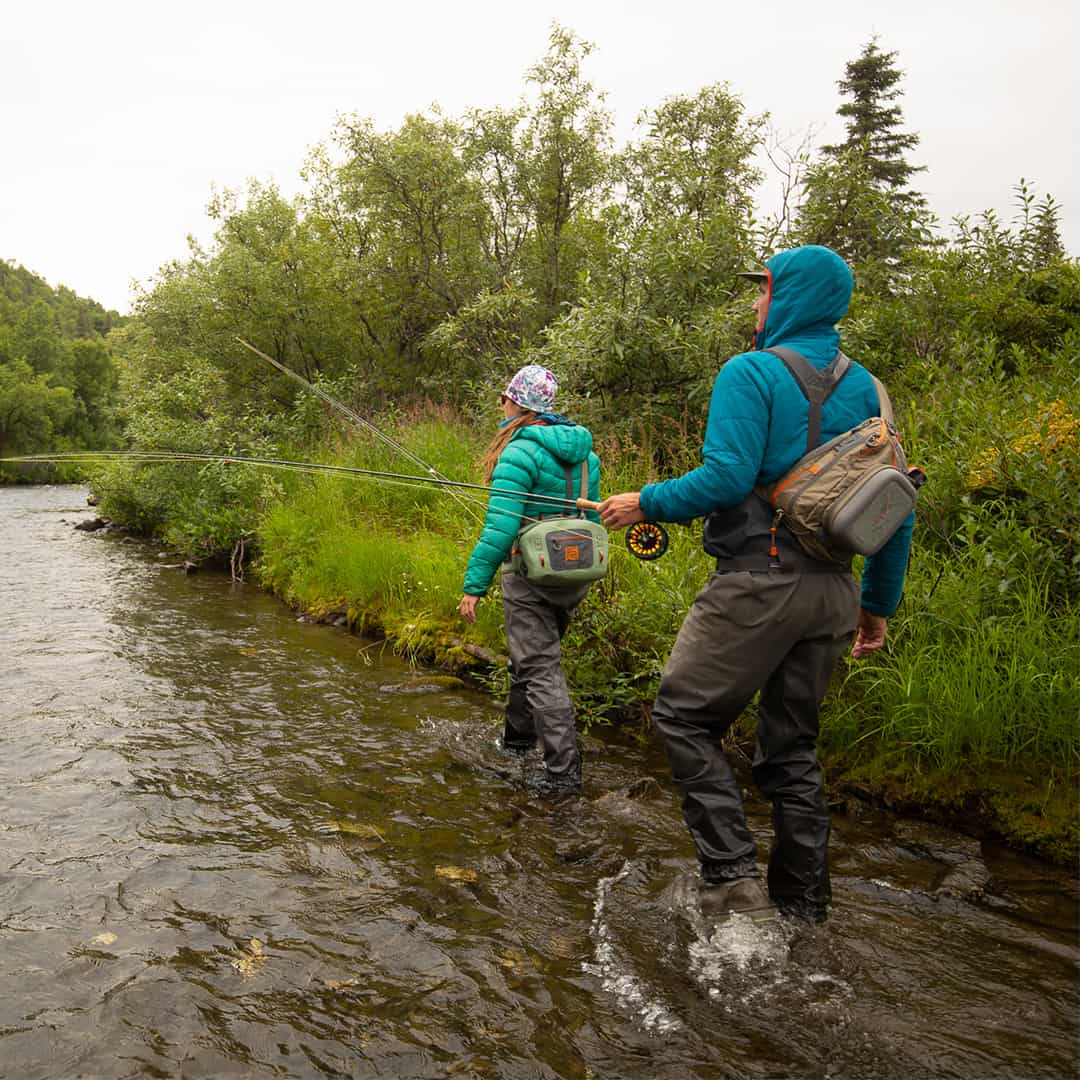 SS-2.0-G 816332014901 Fishpond Summit Fly Fishing Sling Pack Granite Gravel Walking the Edge of River
