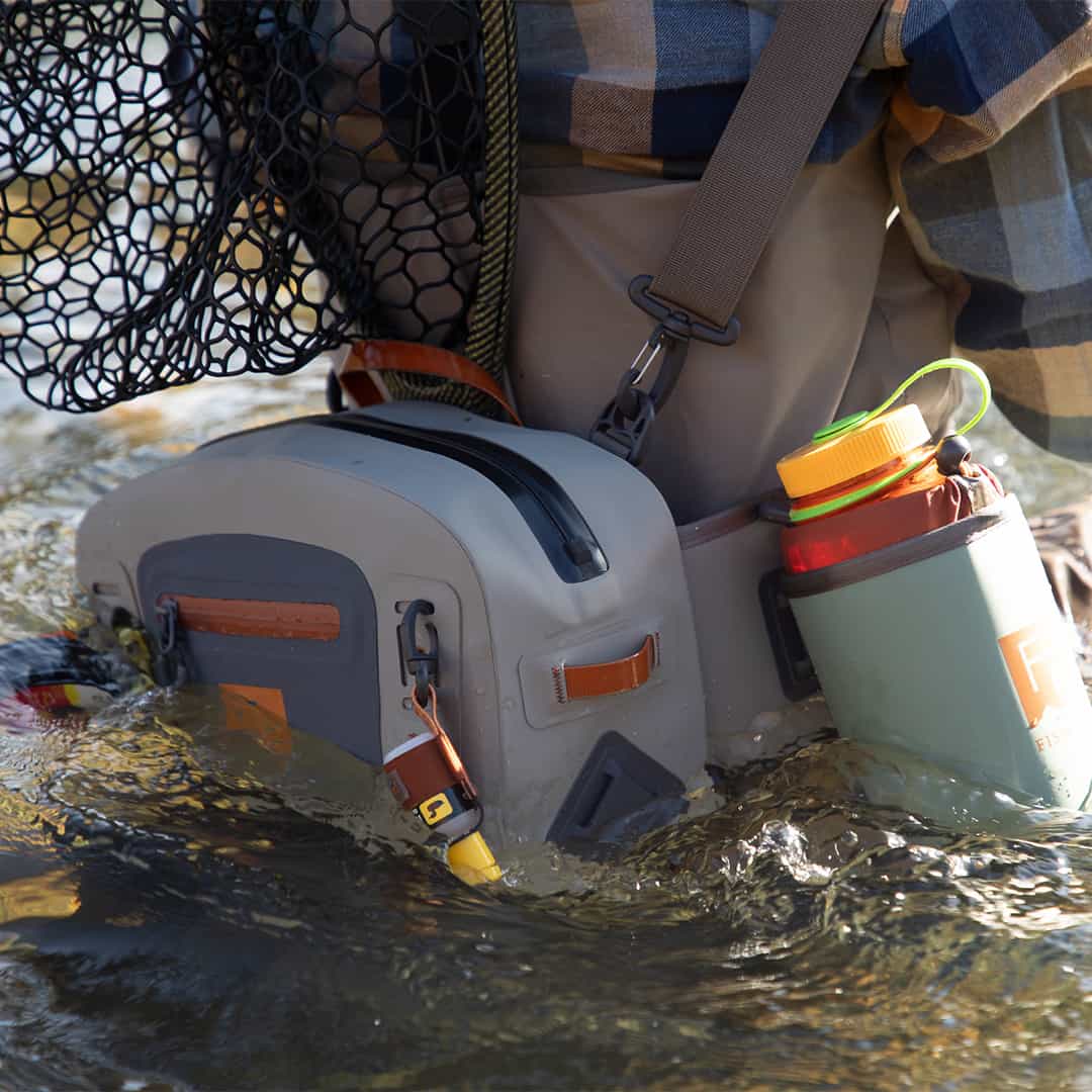 TSL-ES 816332015229 Fishpond Thunderhead Waterproof and Submersible Waist or Hip Pack Eco Shale Submerged in the water