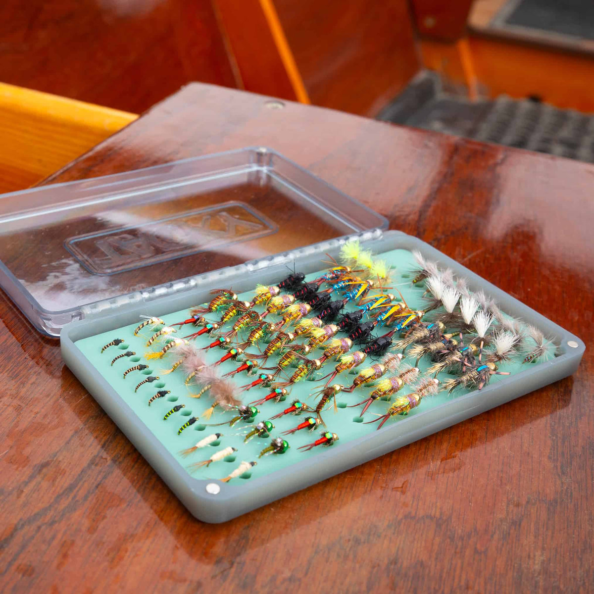 Tacky Day Pack Fly Box Single Sided Fly Box With Silicone Storage Slits Open On Table Closeup