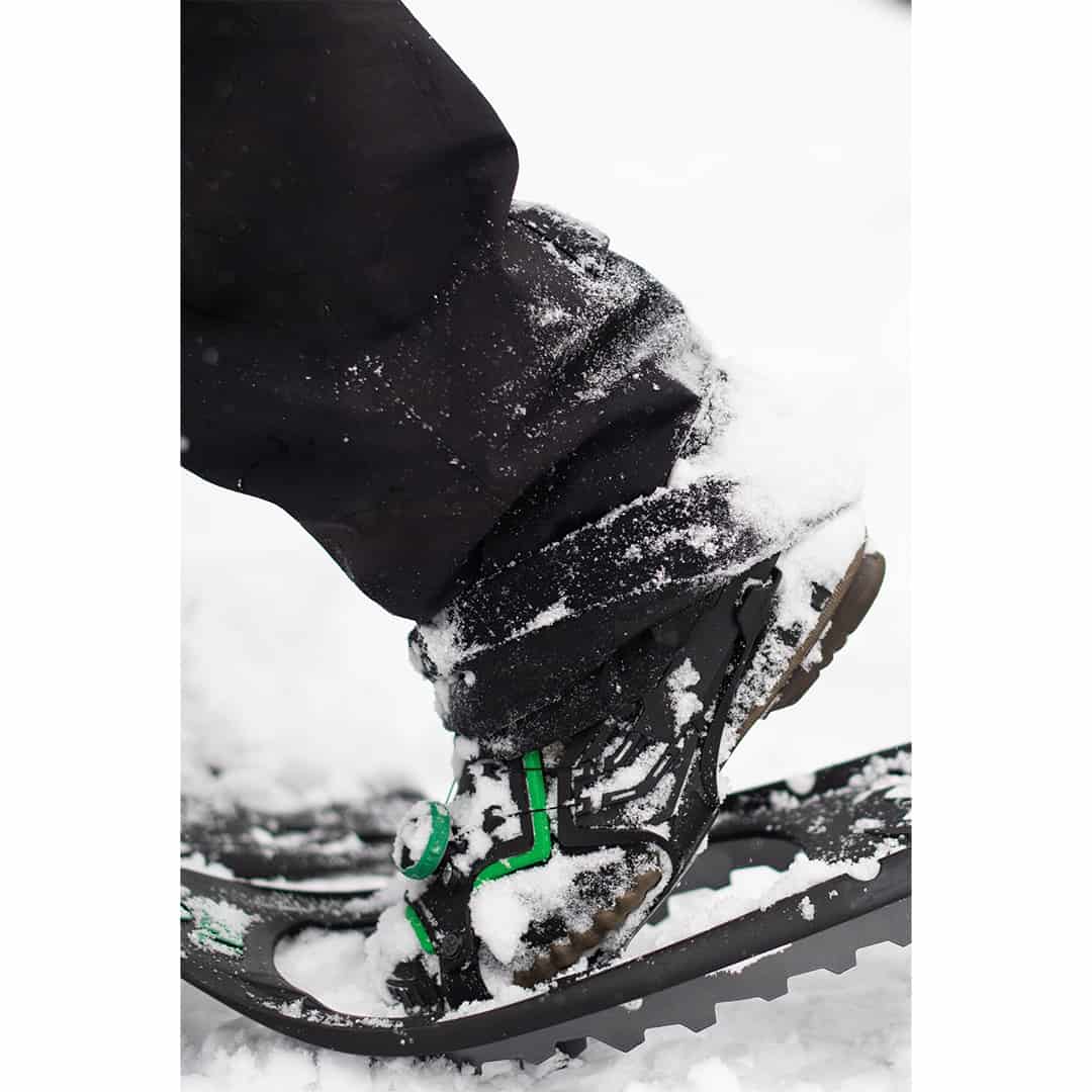 Tubbs Flex RDG Mens Snowshoe 24" Taking a step in snow