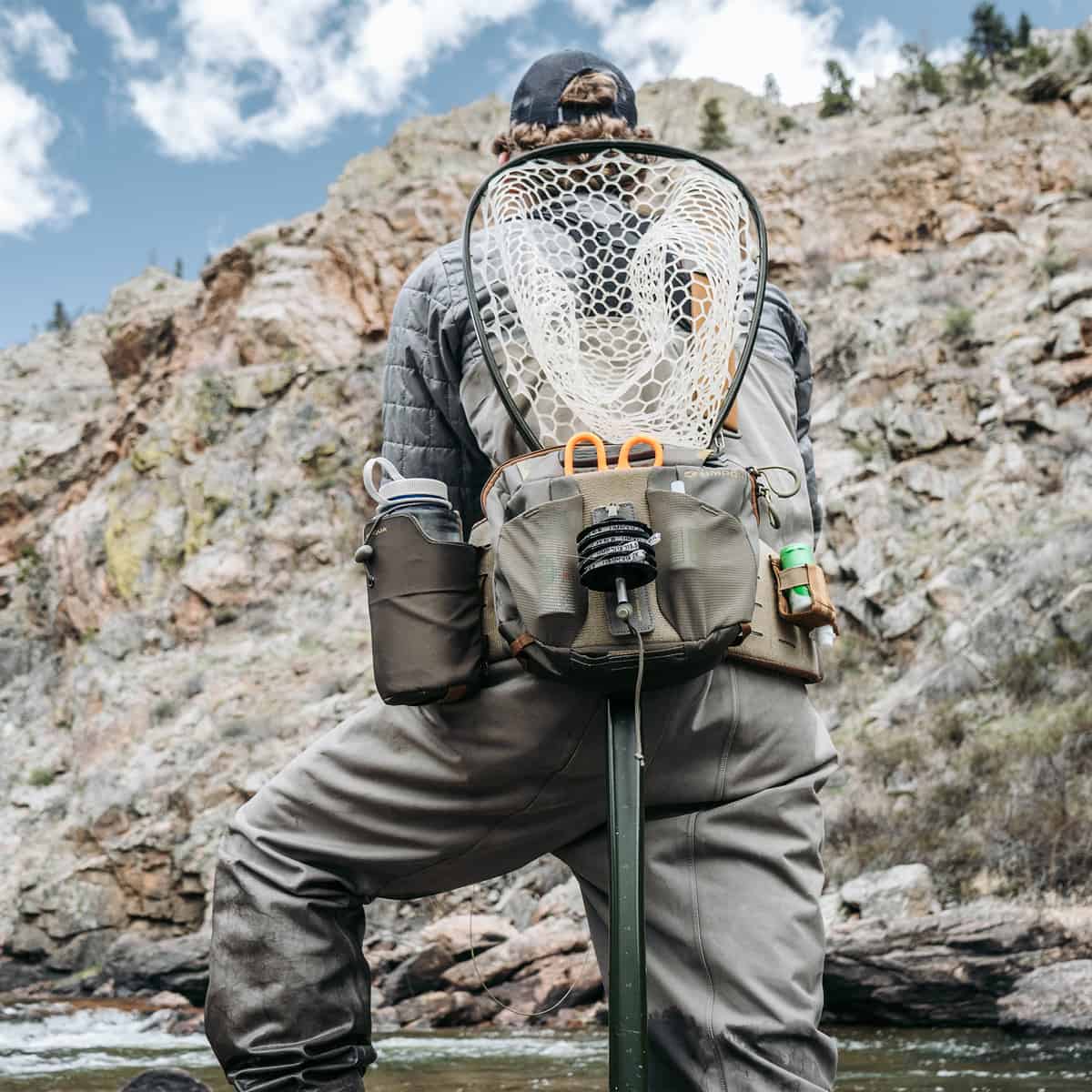 Umpqua ZS2 Ledges 500 Fly Fishing Waist Pack Back Olive Fishing Closeup