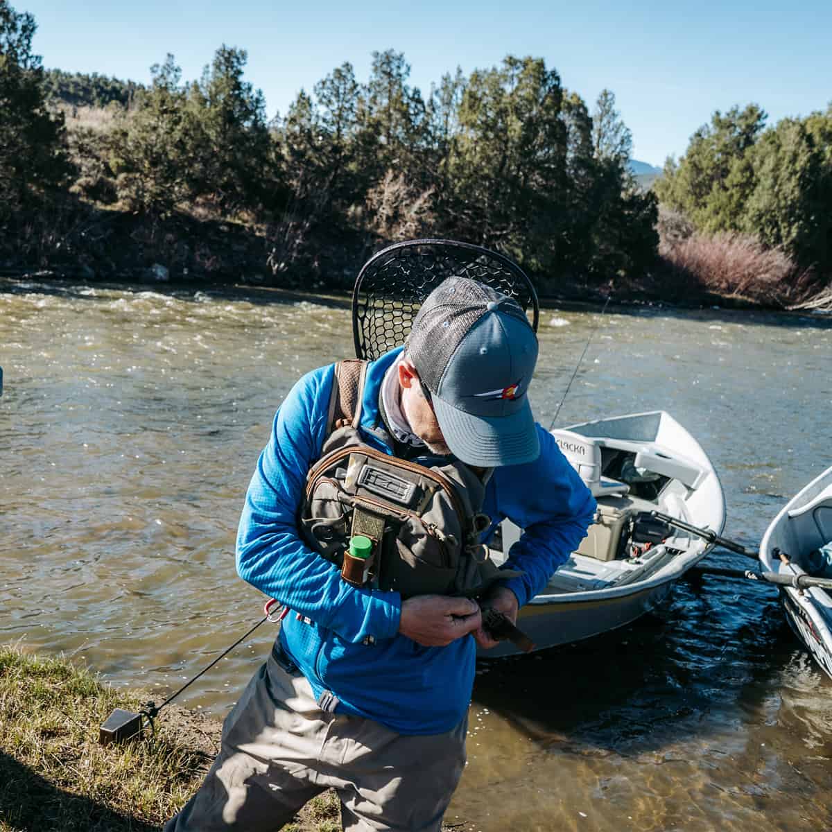 Umpqua ZS2 Overlook 500 Chest Fishing Pack Kit Back With Net On River Eagle