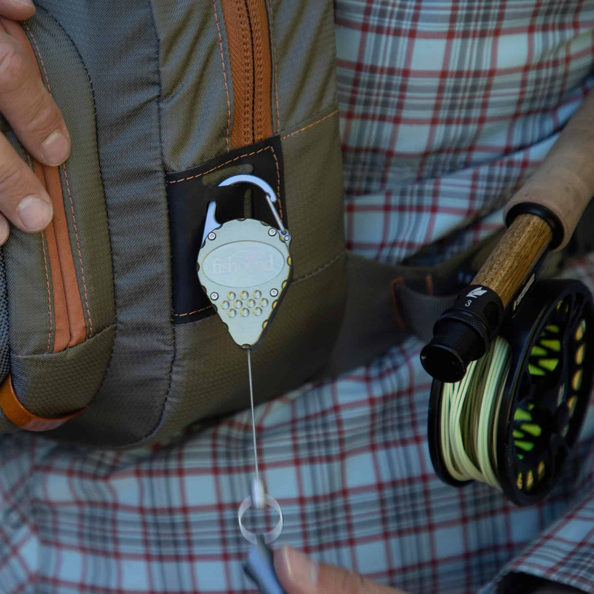 fishpond arrowhead fishing accessory retractor fishing zinger moss color on fishpond pack
