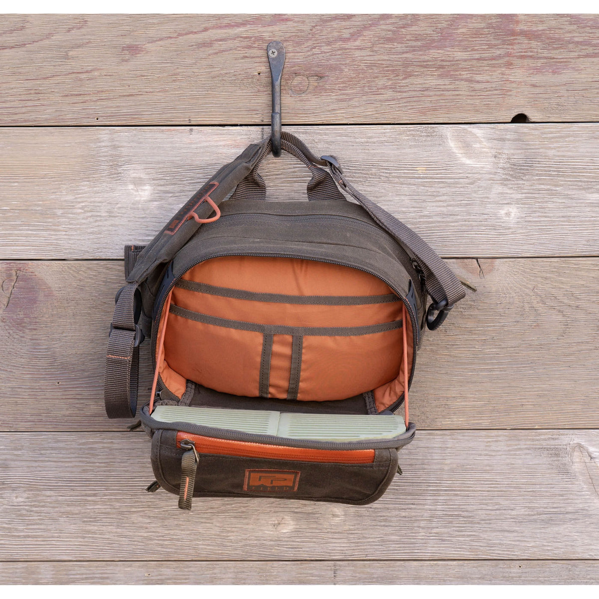 fishpond blue river peat moss lumbar pack chest pack waxed canvas fishing bag open