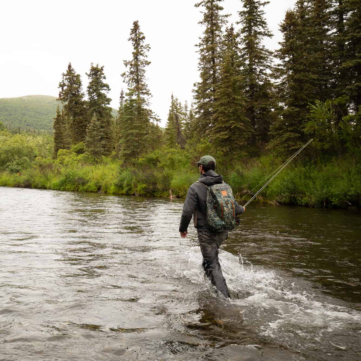 fishpond thunderhead waterproof fly fishing backpack eco riverbed camo fishing on river