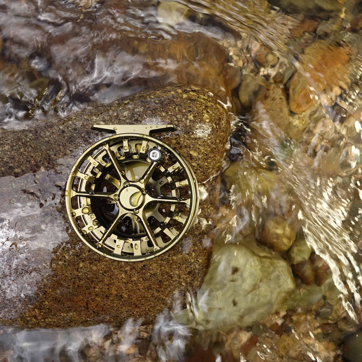 waterworks lamson guru s fly reel og olive green fly fishing reel in water alt version