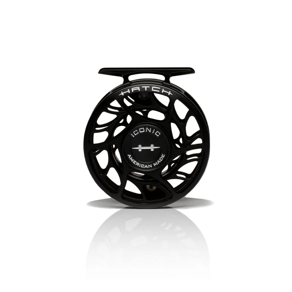 The Front of a black fly fishing reel with 'Hatch Iconic' branding on a white background featuring UPC 704715337061