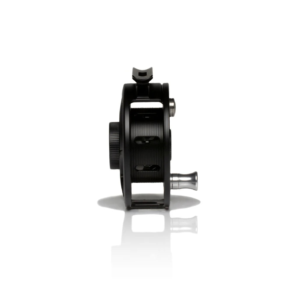 The side of a black fly fishing reel called the 'Hatch Iconic' on a white background featuring UPC 704715337061