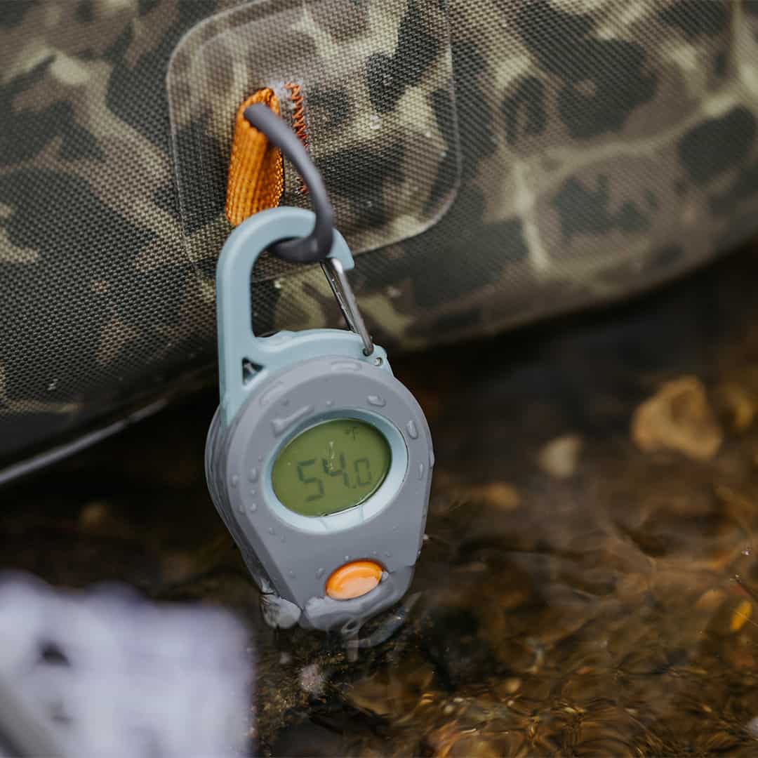 816332016202 Fishpond Riverkeeper Digital Fishing Thermometer On Thunderhead Sling Bag Probe In Water