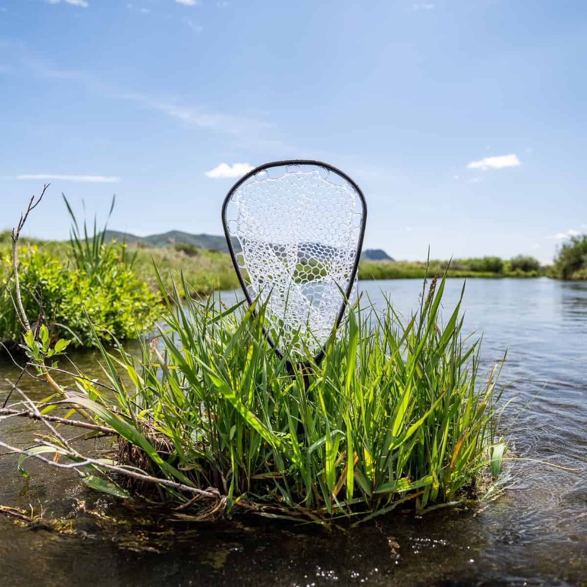 NCN 816332016240 Fishpond Nomad Canyon Fly Fishing Net Floating In River