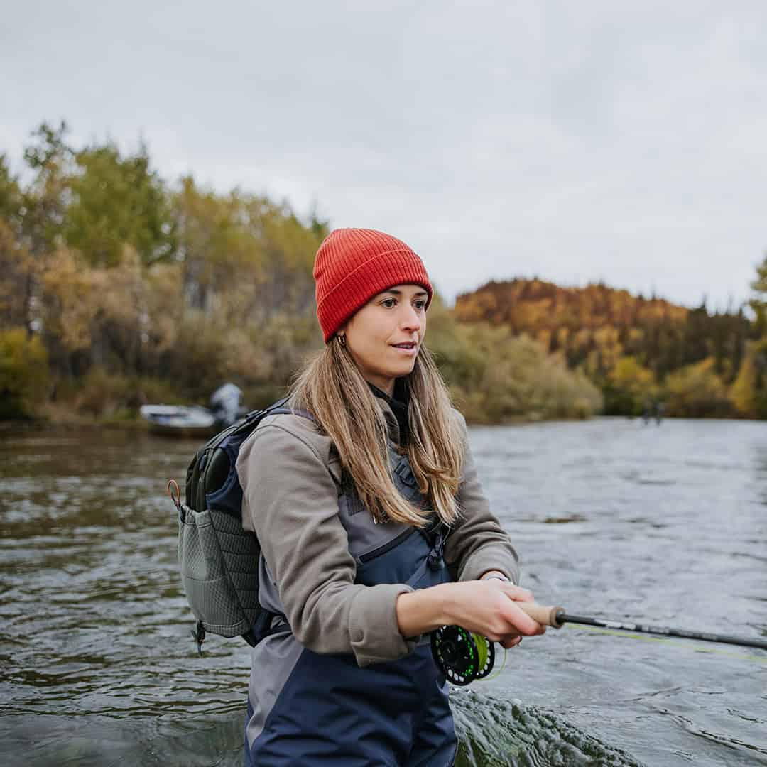 New 2025 816332016233 Fishpond Stormshadow Sling Pack Water Resistant Ambidextrous Fly Fishing Sling Pack On Woman Model for size reference