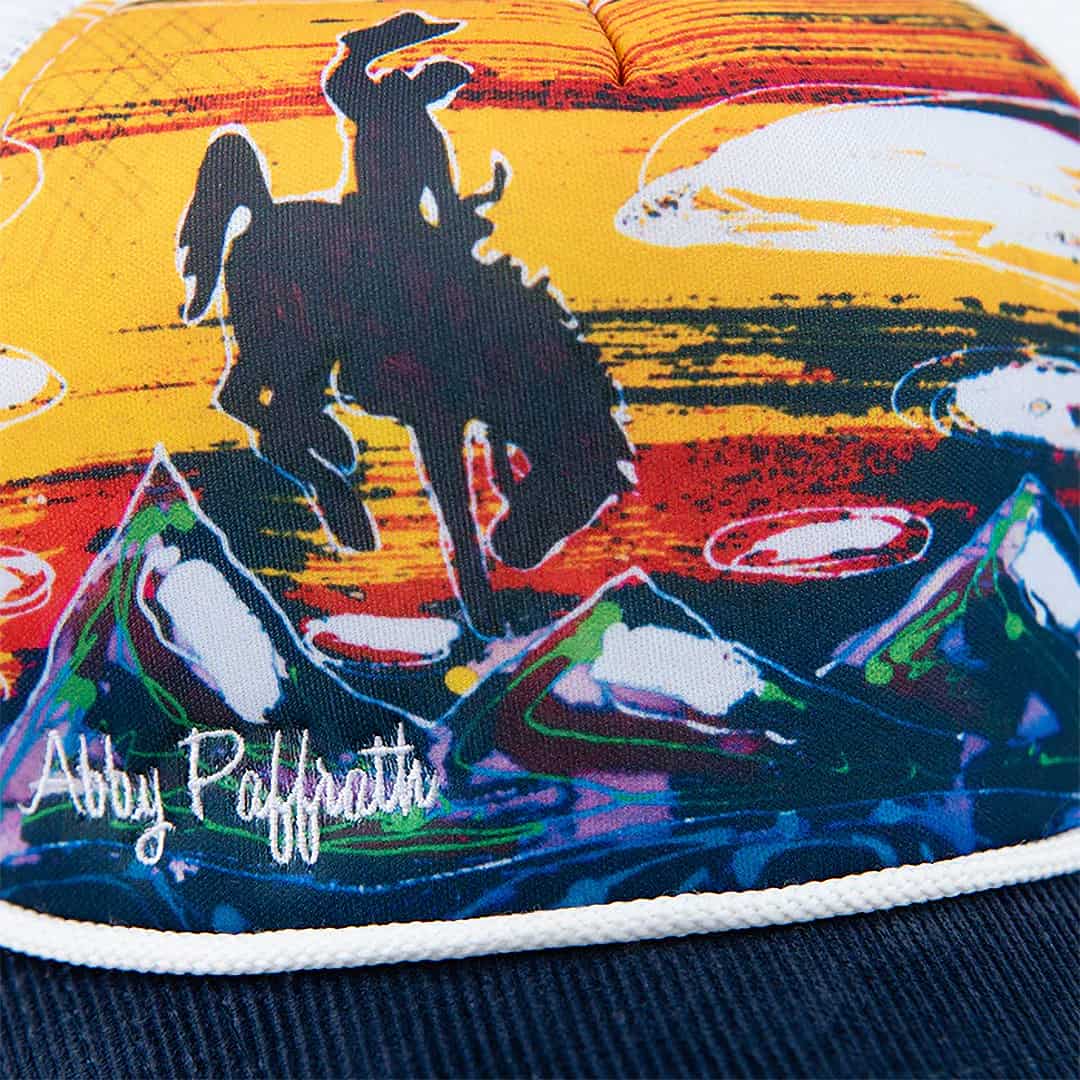 art 4 all let er buck trucker hat by abby paffrath featuring jackson hole artwork