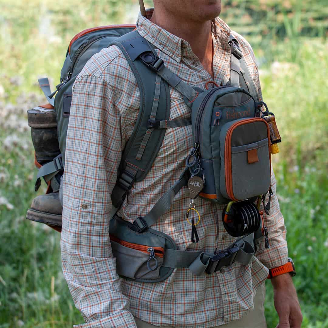 FHBP 816332014765 Fishpond Firehole Fishing and Travel Backpack With Fishpond Canyon Creek Attached To Front Dtail