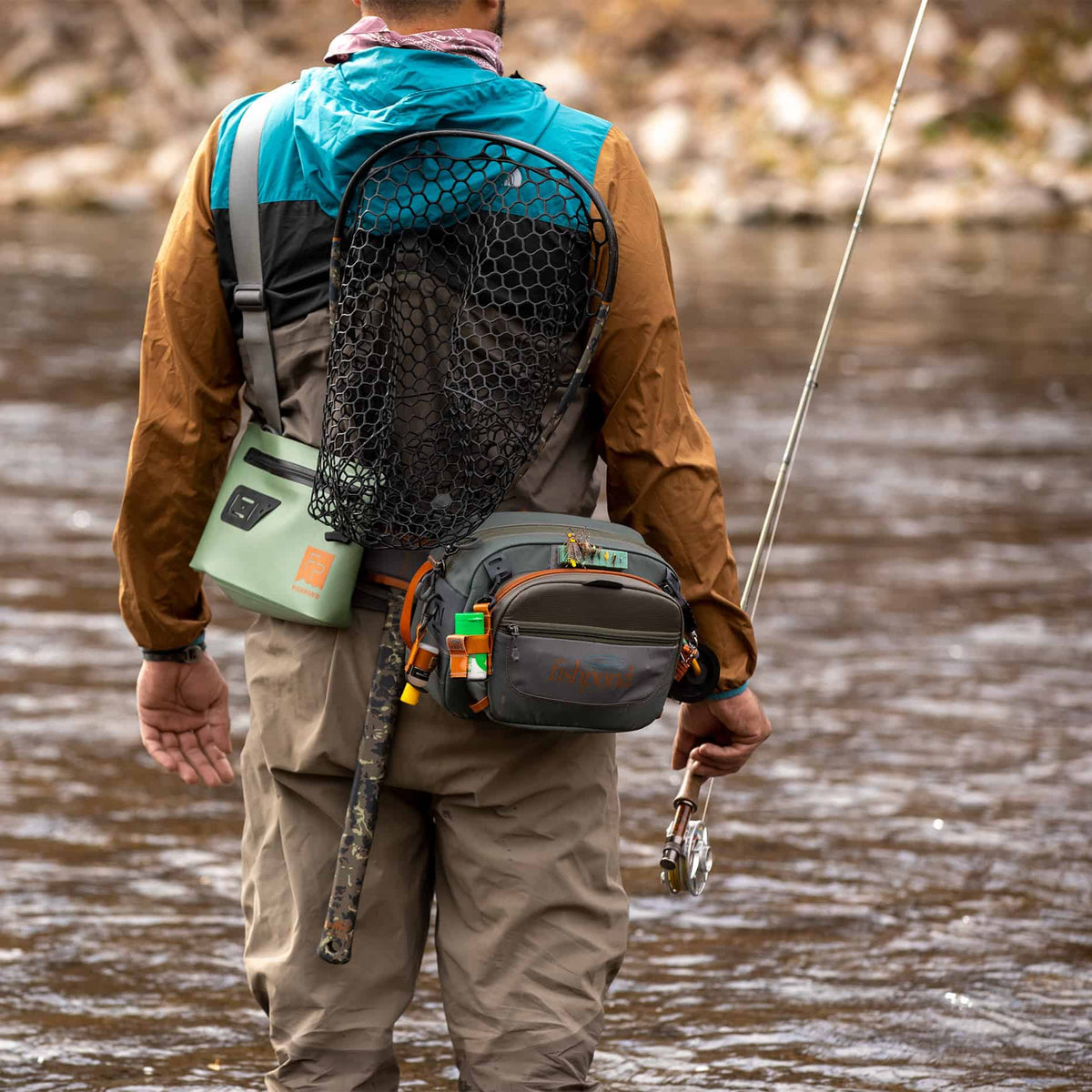 Fishpond Switchback Pro Fly Fishing Waist Pack Out Fishing Standing In River